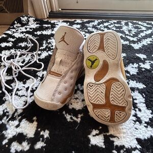 Jordan White and Gold Sneakers with Sleek Design